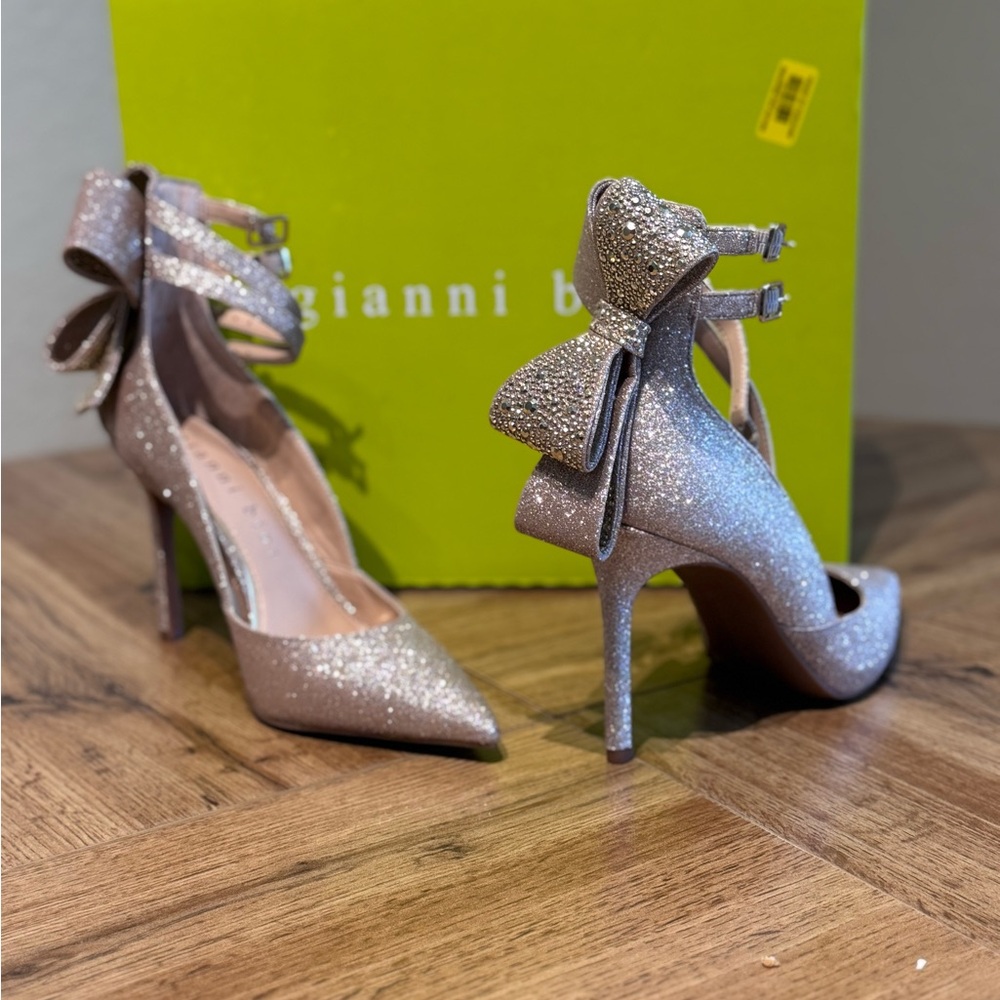 New/ never used Gianni Bini Silver Stiletto Heels with Bow